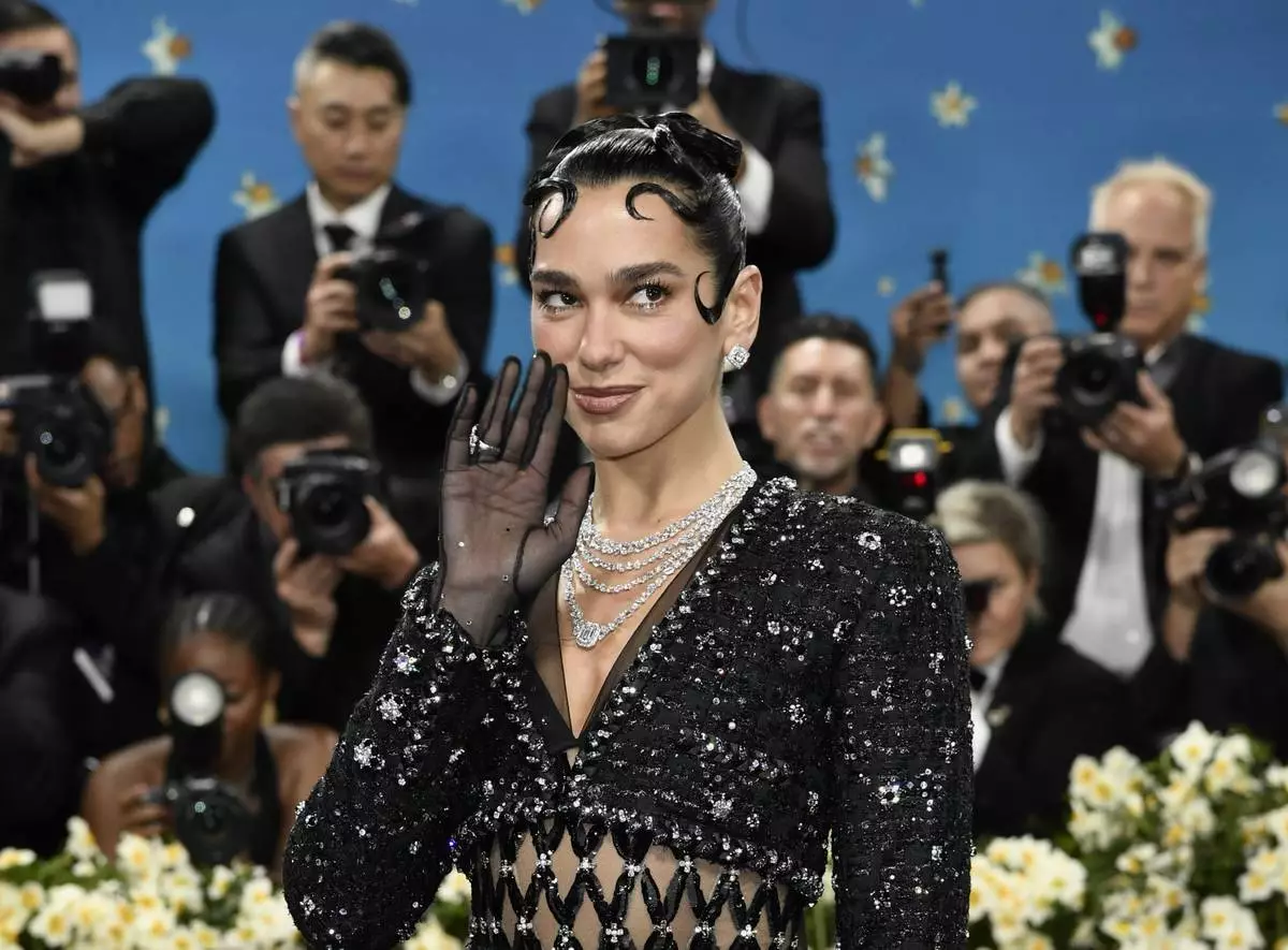 Dua Lipa attends The Metropolitan Museum of Art's Costume Institute benefit gala celebrating the opening of the "Superfine: Tailoring Black Style" exhibition on Monday, May 5, 2025, in New York. (Photo by Evan Agostini/Invision/AP)
