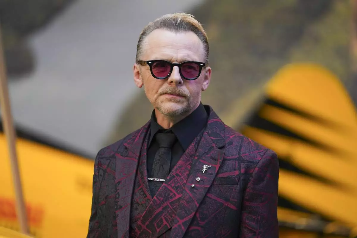 Simon Pegg poses for photographers upon arrival at the premiere of the film 'Mission: Impossible - The Final Reckoning' on Thursday, May 15, 2025, in London. (Photo by Alberto Pezzali/Invision/AP)
