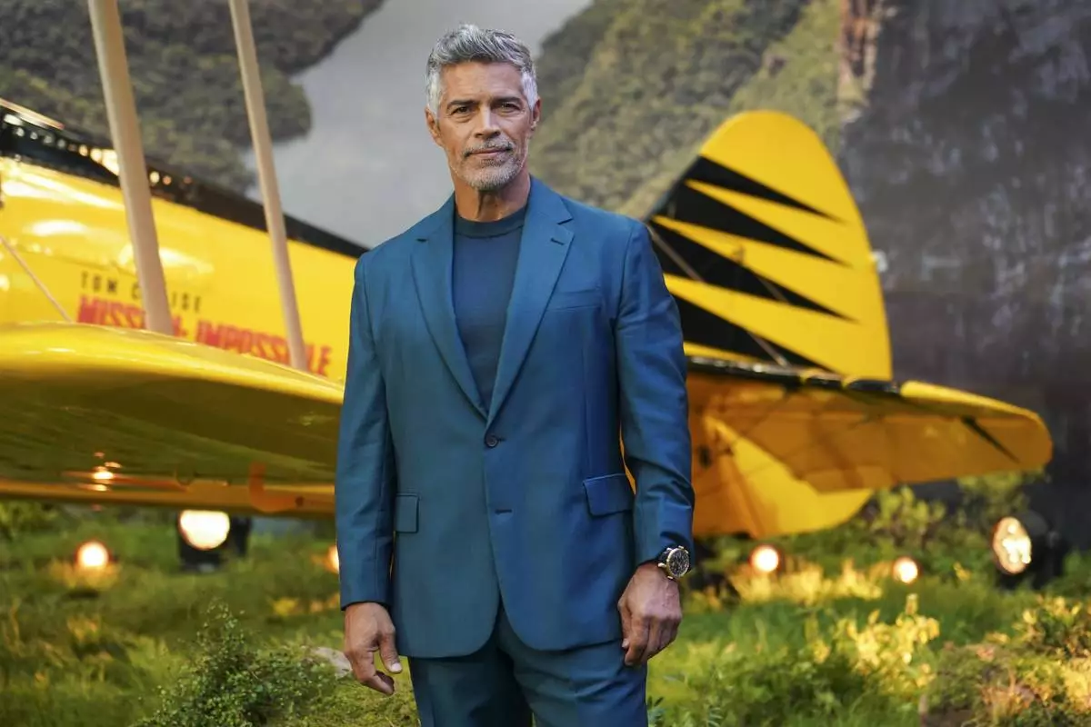Esai Morales poses for photographers upon arrival at the premiere of the film 'Mission: Impossible - The Final Reckoning' on Thursday, May 15, 2025, in London. (Photo by Alberto Pezzali/Invision/AP)
