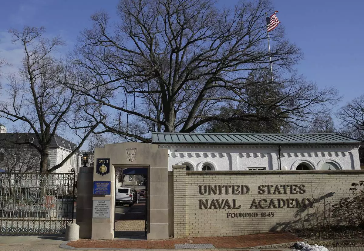 FILE - A sign at entrance to the U.S. Naval Academy campus in Annapolis, Md., Jan. 9,2014. (AP Photo/Patrick Semansky, File)