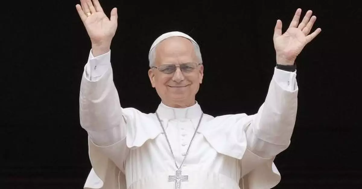 AP PHOTOS: Pope Leo XVI addresses crowds in his first Sunday noon blessing as pontiff