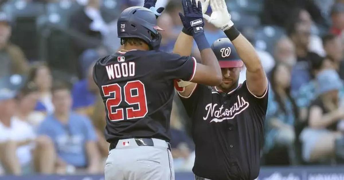 Hassell hits 1st major league homer and Nationals rout Mariners 9-0