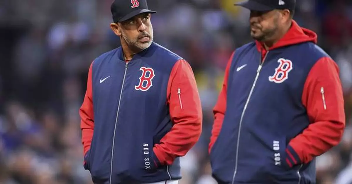 Red Sox manager Alex Cora empathizes with reliever Liam Hendriks following offensive messages