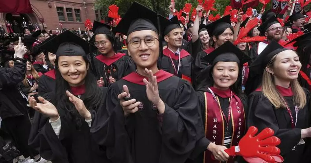 AP PHOTOS: Harvard students celebrate graduating amid a legal battle with the White House