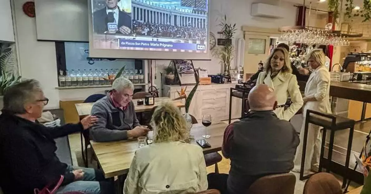 Locals gather for red wine spritz and conclave watch in a cardinal's hometown