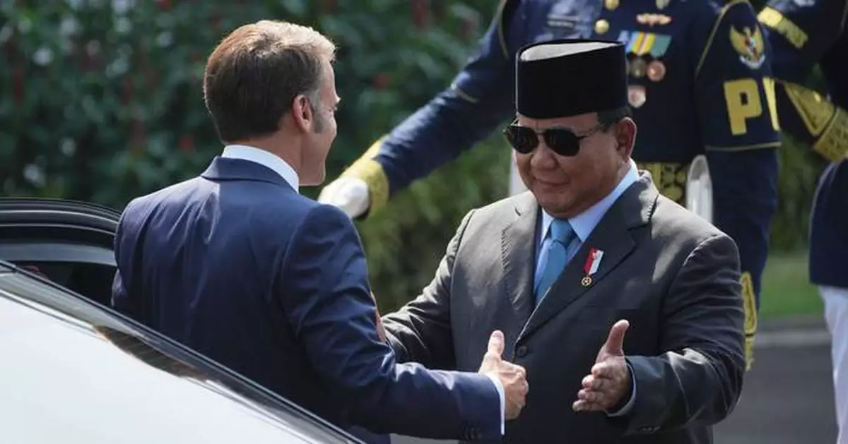 France's Macron presses ahead in his Southeast Asia tour with talks in Indonesia