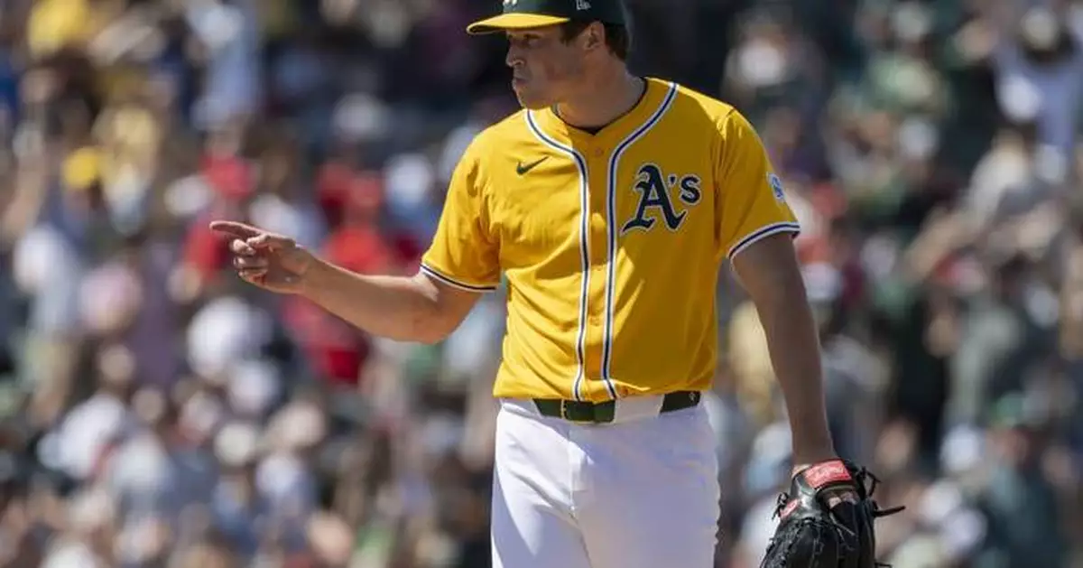 A's catcher MacIver gets go-ahead hit, throws out runner to end game in big league debut at age 28