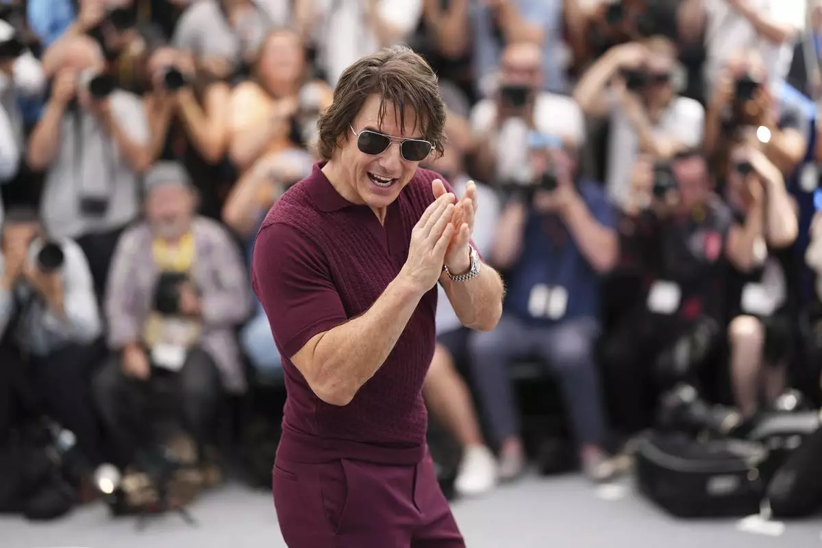 Tom Cruise poses for photographers during the photo call for the film 'Mission: Impossible – The Final Reckoning' at the 78th international film festival, Cannes, southern France, Wednesday, May 14, 2025. (Photo by Scott A Garfitt/Invision/AP)