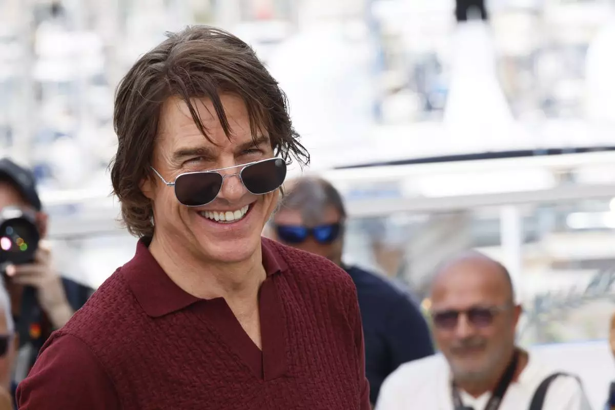 Tom Cruise poses for photographers during the photo call for the film 'Mission: Impossible – The Final Reckoning' at the 78th international film festival, Cannes, southern France, Wednesday, May 14, 2025. (Photo by Joel C Ryan/Invision/AP)