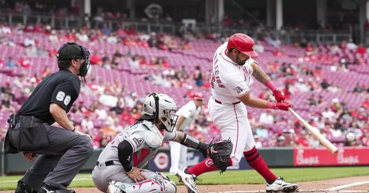Encarnacion-Strand lifts the Reds over the Diamondbacks 4-3 in 10th inning of suspended game