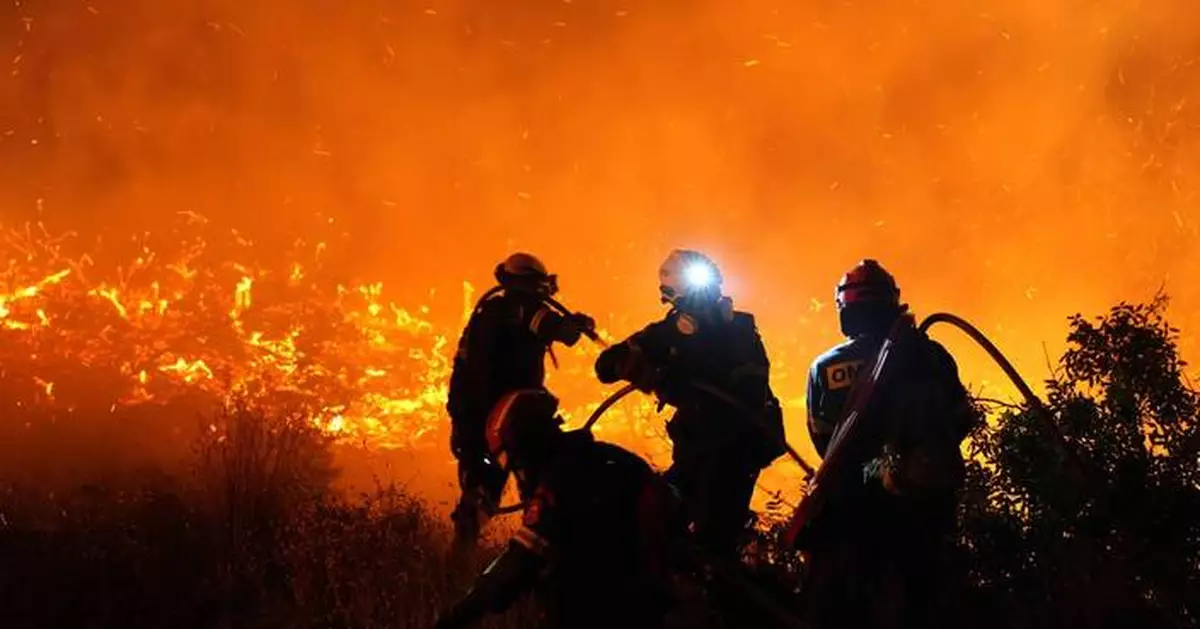 Firefighters battle a wildfire burning out of control on the Greek island of Chios