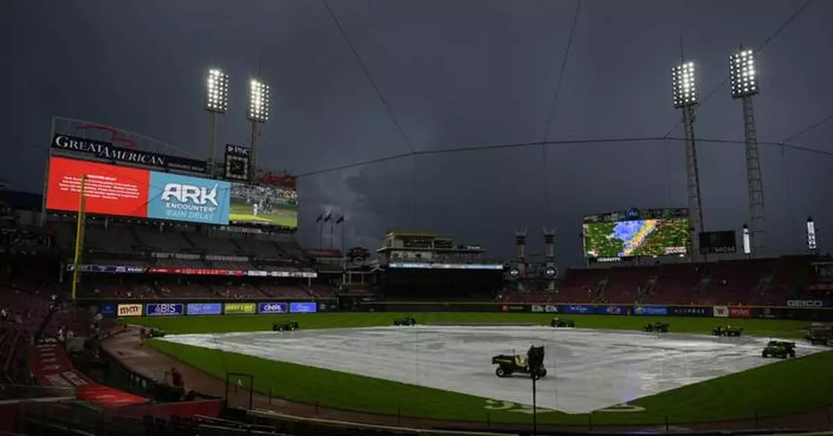 Steer hits a 2-run homer and Reds win rain-shortened game 4-2 over Twins.