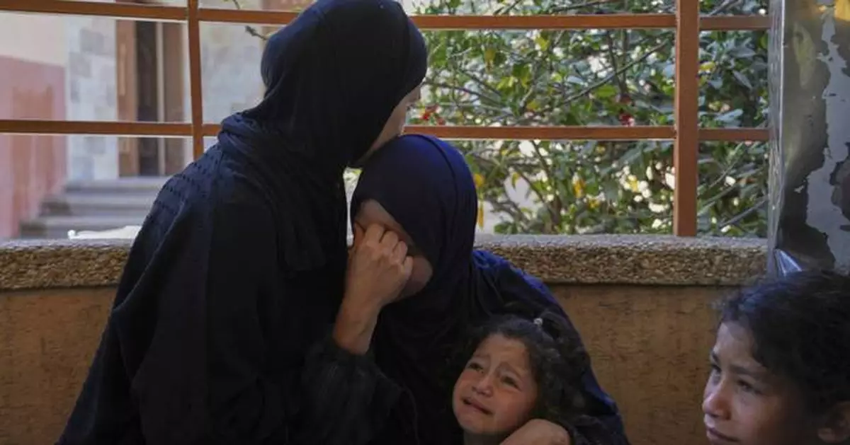 Israeli forces open fire a kilometer away from Gaza aid site, killing 3, health officials say