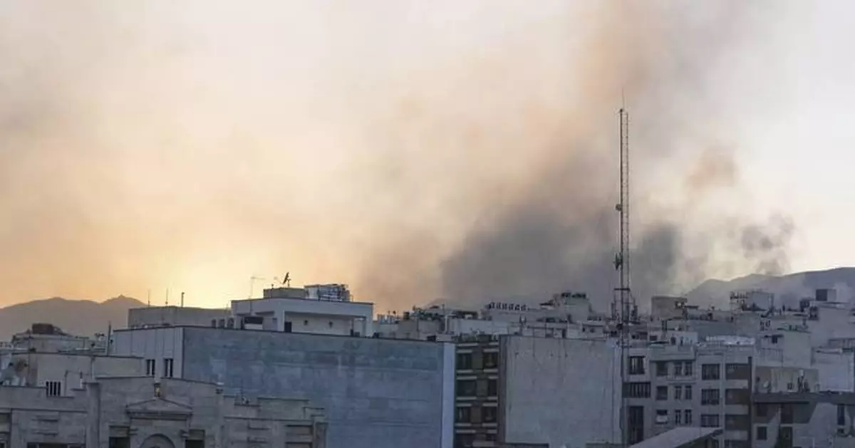 The Latest: Israel threatens Iran's supreme leader as Iranian strikes wound over 200