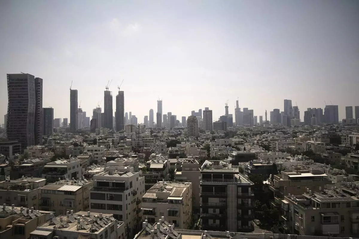 A general view of Tel Aviv's skyline, Friday, June 13, 2025. (AP Photo/Leo Correa)