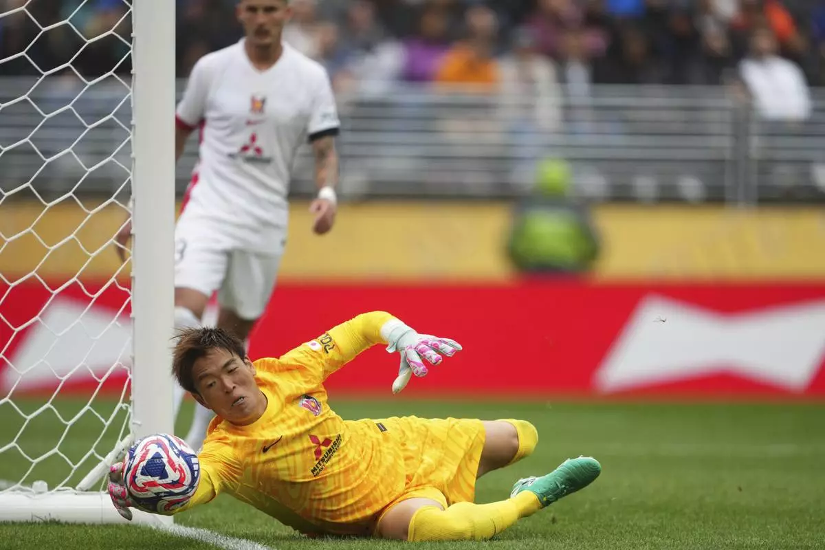 Urawa Red Diamonds' Shusaku Nishikawa makes a save during the Club World Cup Group E soccer match between Inter Milan and Urawa Red Diamonds in Seattle, Saturday, June 21, 2025. (AP Photo/Lindsey Wasson)