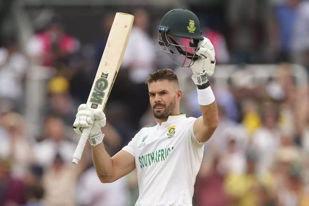South Africa's Aiden Markram celebrates after scoring a century on day three of the World Test Championship final between South Africa and Australia at Lord's cricket ground in London, Friday, June 13, 2025. (AP Photo/Kirsty Wigglesworth)