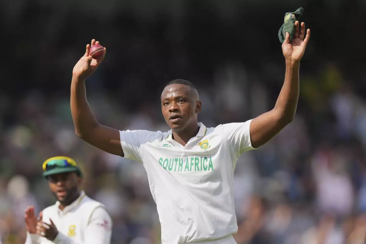 South Africa's Kagiso Rabada celebrates after his five-wicket haul during the World Test Championship final between South Africa and Australia at Lord's cricket ground in London, Wednesday, June 11, 2025. (AP Photo/Kirsty Wigglesworth)