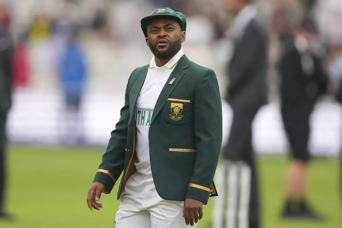 South Africa's captain Temba Bavuma walks onto the field ahead of the World Test Championship final between South Africa and Australia at Lord's cricket ground in London, Wednesday, June 11, 2025. (AP Photo/Kirsty Wigglesworth)
