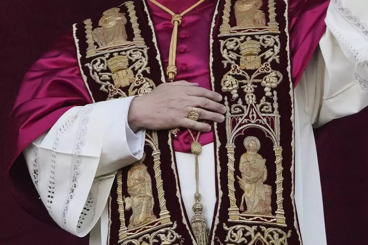 FILE - Newly elected Pope Leo XIV appears at the balcony of St. Peter's Basilica at the Vatican, May 8, 2025. (AP Photo/Alessandra Tarantino, File)