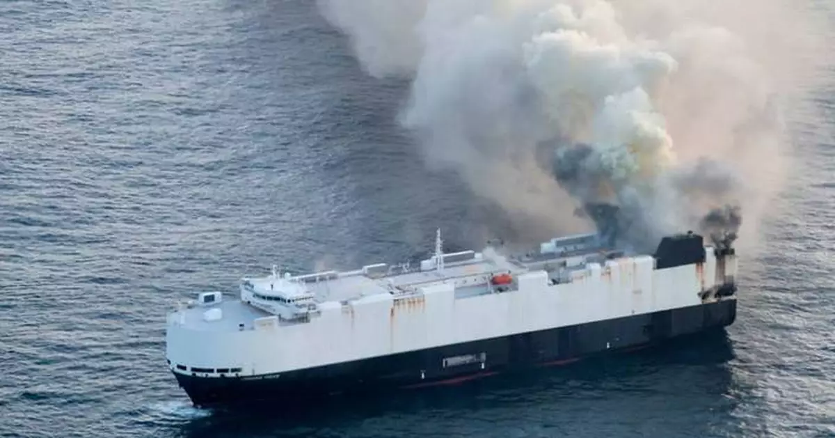 22 crew members rescued from lifeboat in North Pacific after ship carrying 3,000 cars catches fire