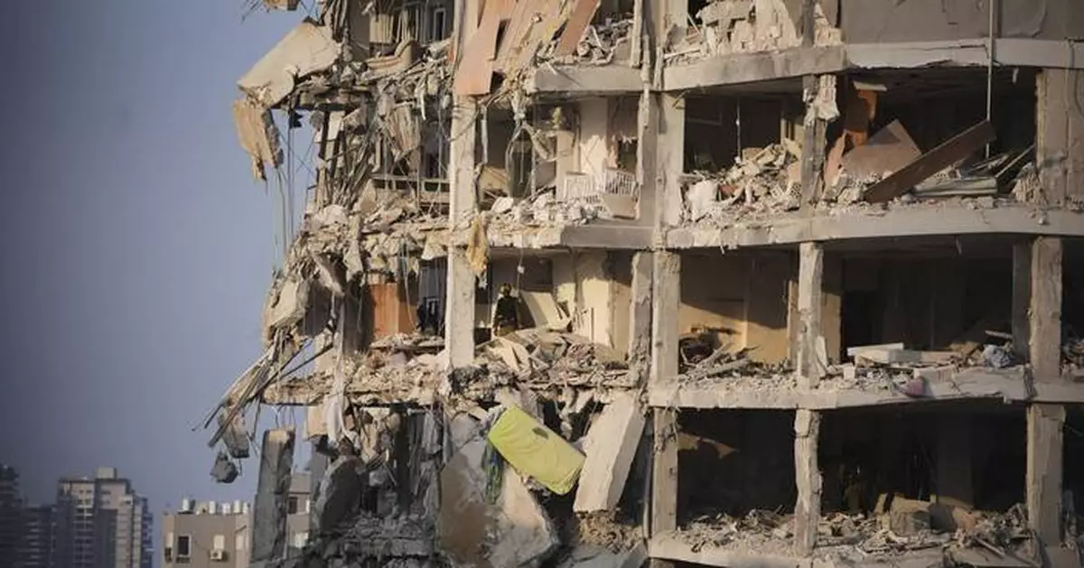 The Latest: Death toll grows as Israel and Iran trade attacks for third day