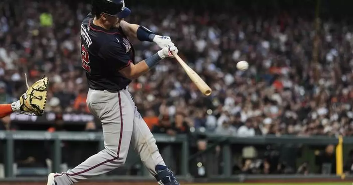A ball thrown from the stands causes moment of confusion in Braves-Giants game