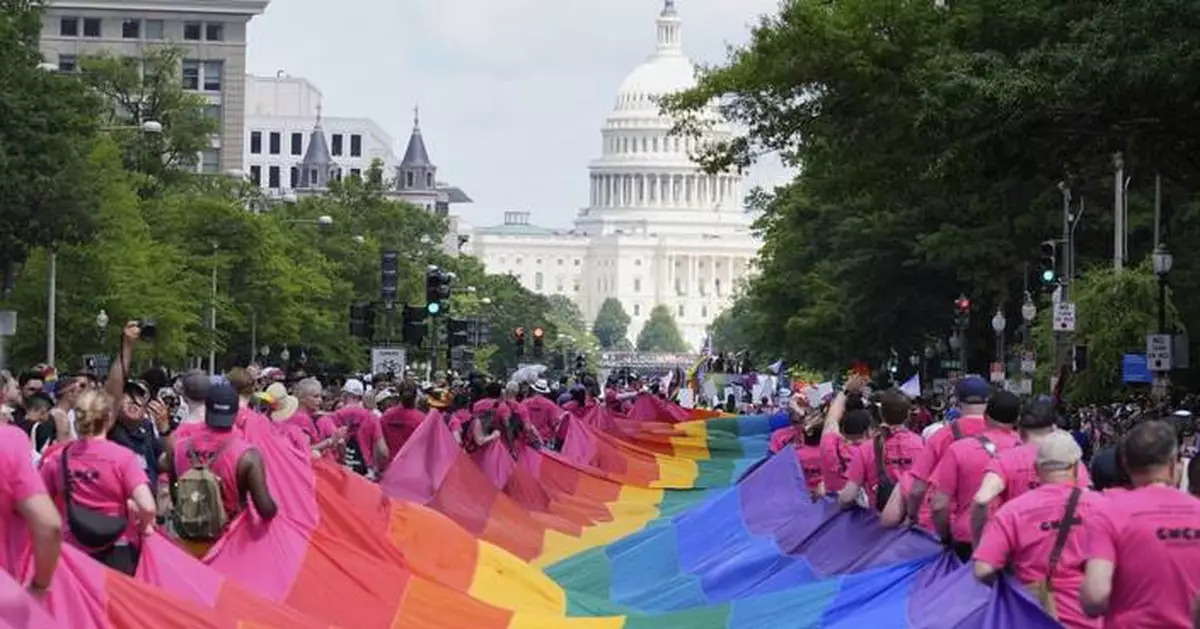 AP PHOTOS: World Pride gathers LGBTQ+ advocates in Washington for 50th anniversary