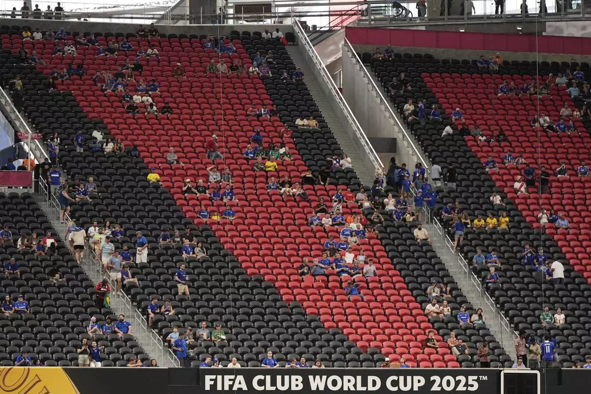 Fans wait for the start of the Club World Cup Group D soccer match between Chelsea and Los Angeles FC, Monday, June 16, 2025, in Atlanta. (AP Photo/Mike Stewart)