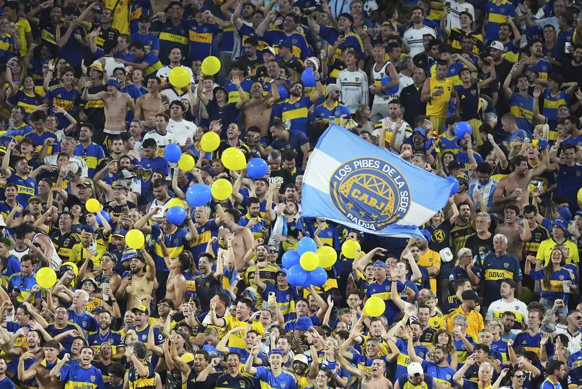 Boja Juniors fans cheer prior to the Club World Cup Group C soccer match between Bayern Munich and Boca Juniors in Miami Gardens, Fla., Friday, June 20, 2025. (AP Photo/Rebecca Blackwell)