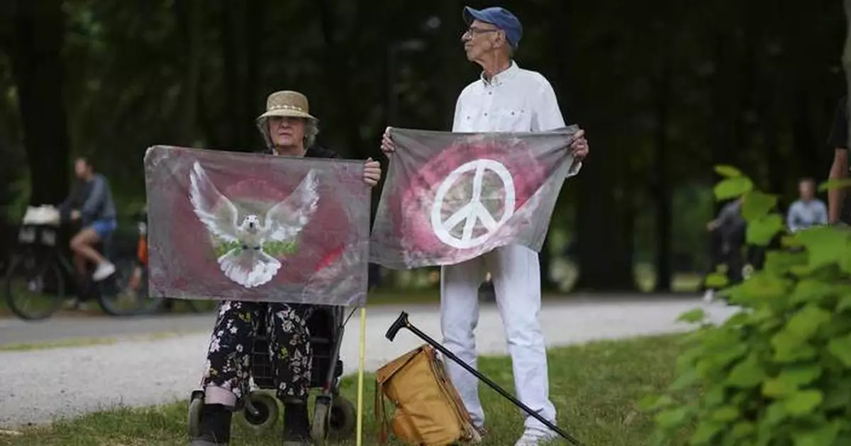 Photos show people protesting a NATO summit in The Hague