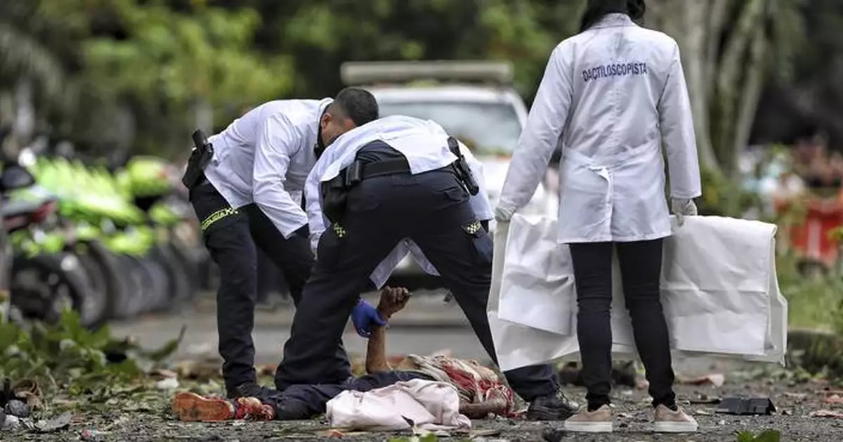At least 7 killed in explosions and attacks outside police stations in southwest Colombia