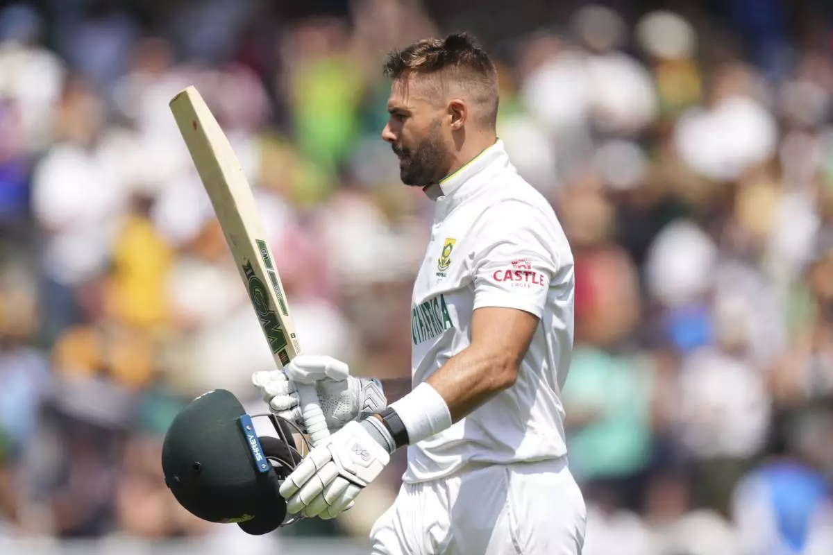 South Africa's Aiden Markram acknowledges the applause from the crowd as he walks off the field after losing his wicket on day four of the World Test Championship final between South Africa and Australia at Lord's cricket ground in London, Saturday, June 14, 2025. (AP Photo/Kirsty Wigglesworth)