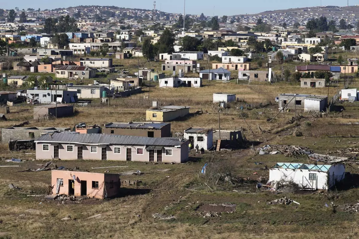 Flood-damaged housing in Mthatha, South Africa, Friday, June 13, 2025. (AP Photo/Themba Hadebe)