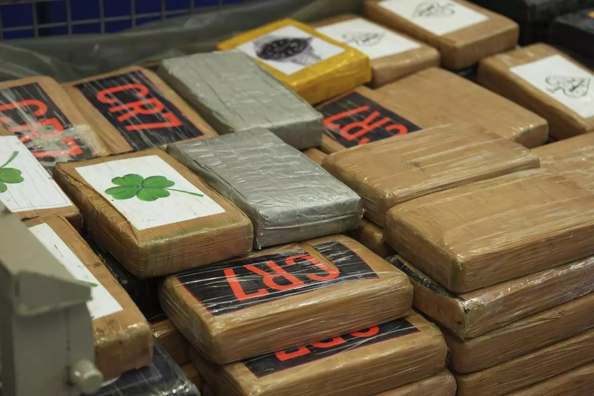 Seized packages of cocaine are presented to media during a news conference at police headquarters in Hamburg, Sept. 27, 2024. (Marcus Brandt/dpa via AP)