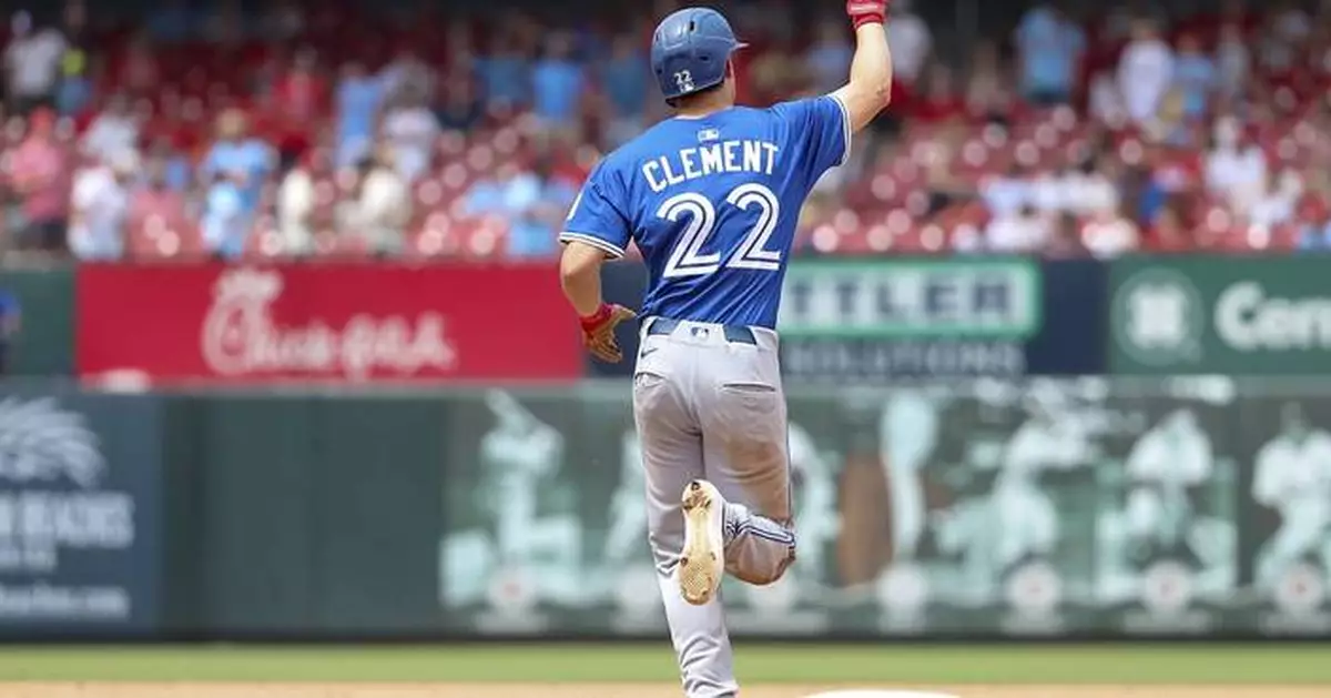 Blue Jays third baseman Ernie Clement leaves game in 9th after banging knee diving for a grounder