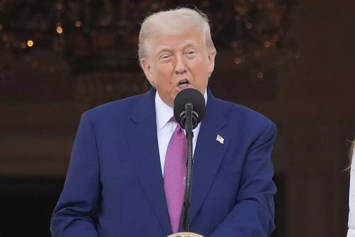 President Donald Trump speaks during the congressional picnic on the South Lawn of the White House, Thursday, June 12, 2025, in Washington. (AP Photo/Alex Brandon)