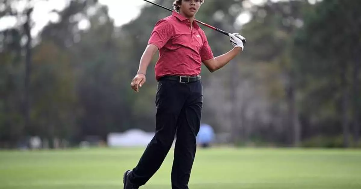 AP PHOTOS: Tiger's son, Charlie Woods, in the spotlight