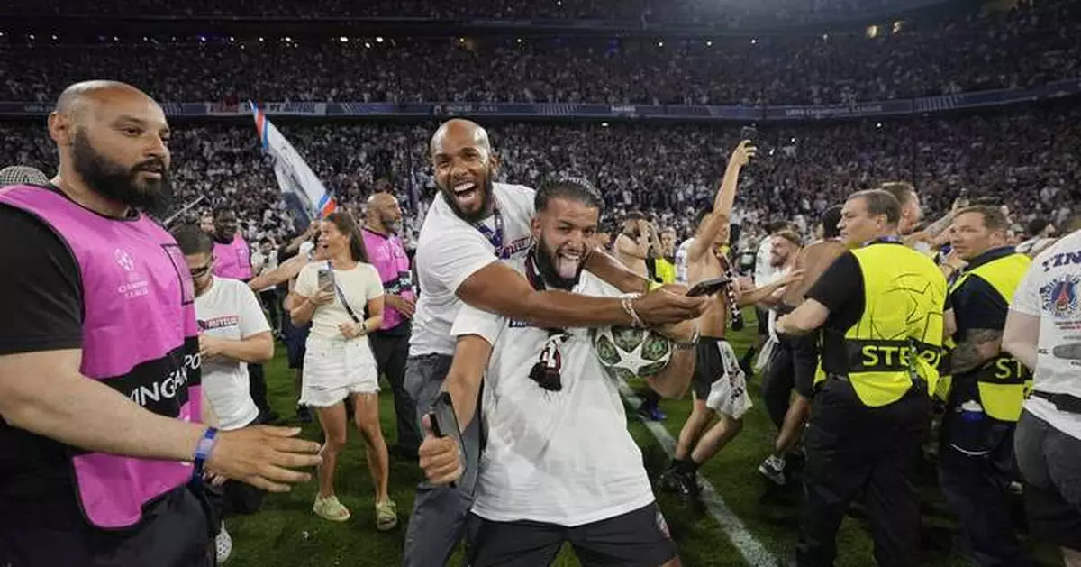 AP PHOTOS: Fans watch as Paris Saint-Germain wins the Champions League for the first time
