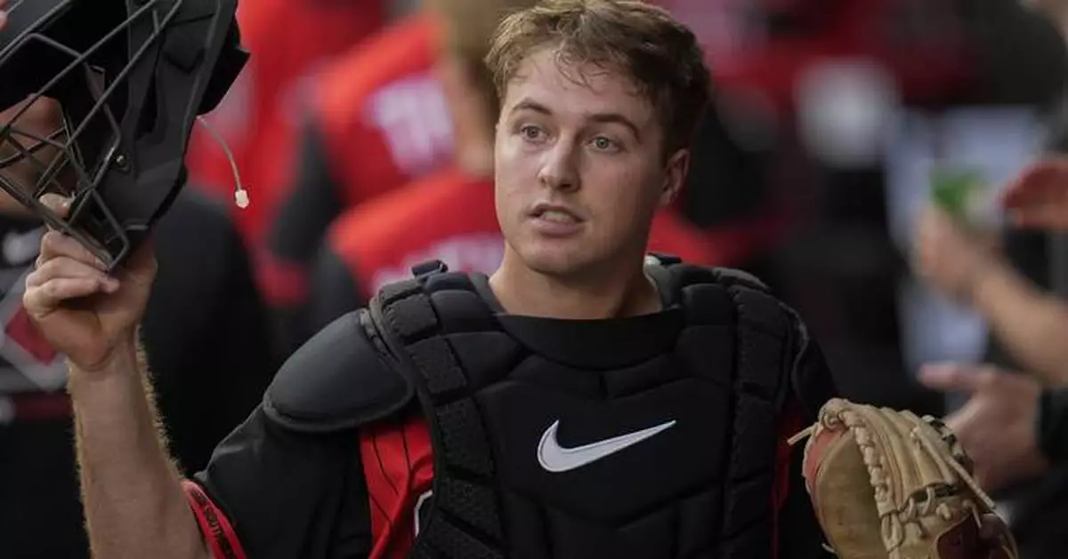 Kyle Teel gets a new shirt as he joins the Chicago White Sox for big league debut