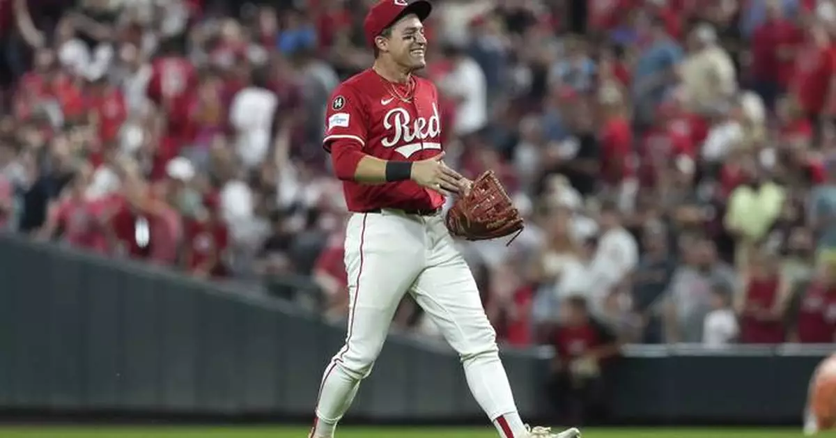 A leaping catch, happy tears, and a win: How TJ Friedl saved the Reds