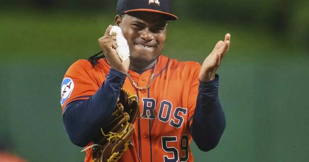 Valdez pushes personal winning streak to 5 as Astros top Pirates 8-2 after long delay