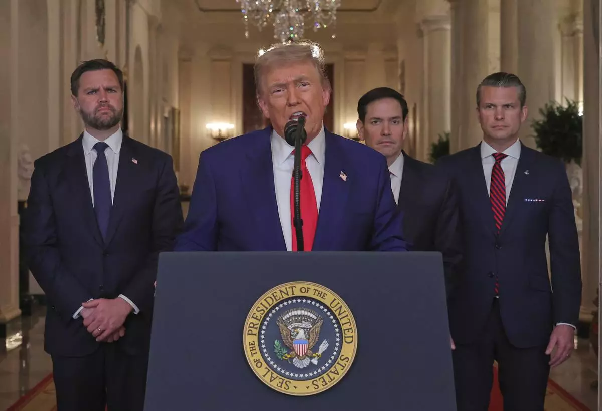 President Donald Trump speaks from the East Room of the White House in Washington, Saturday, June 21, 2025, after the U.S. military struck three Iranian nuclear and military sites, directly joining Israel's effort to decapitate the country's nuclear program, as Vice President JD Vance, Secretary of State Marco Rubio and Defense Secretary Pete Hegseth listen. (Carlos Barria/Pool via AP)