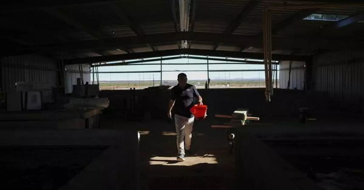 In the Arizona desert, a farm raising fish raises questions about water use