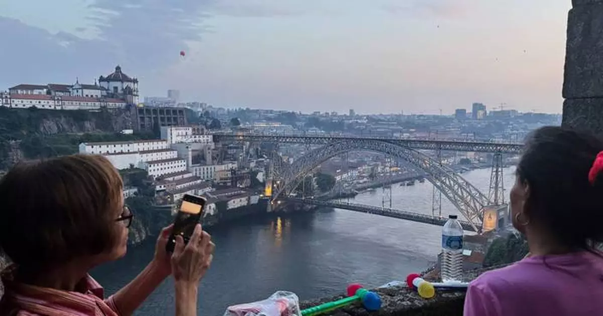 Porto celebrates the summer and a beloved saint with plastic hammers, sardines and leeks