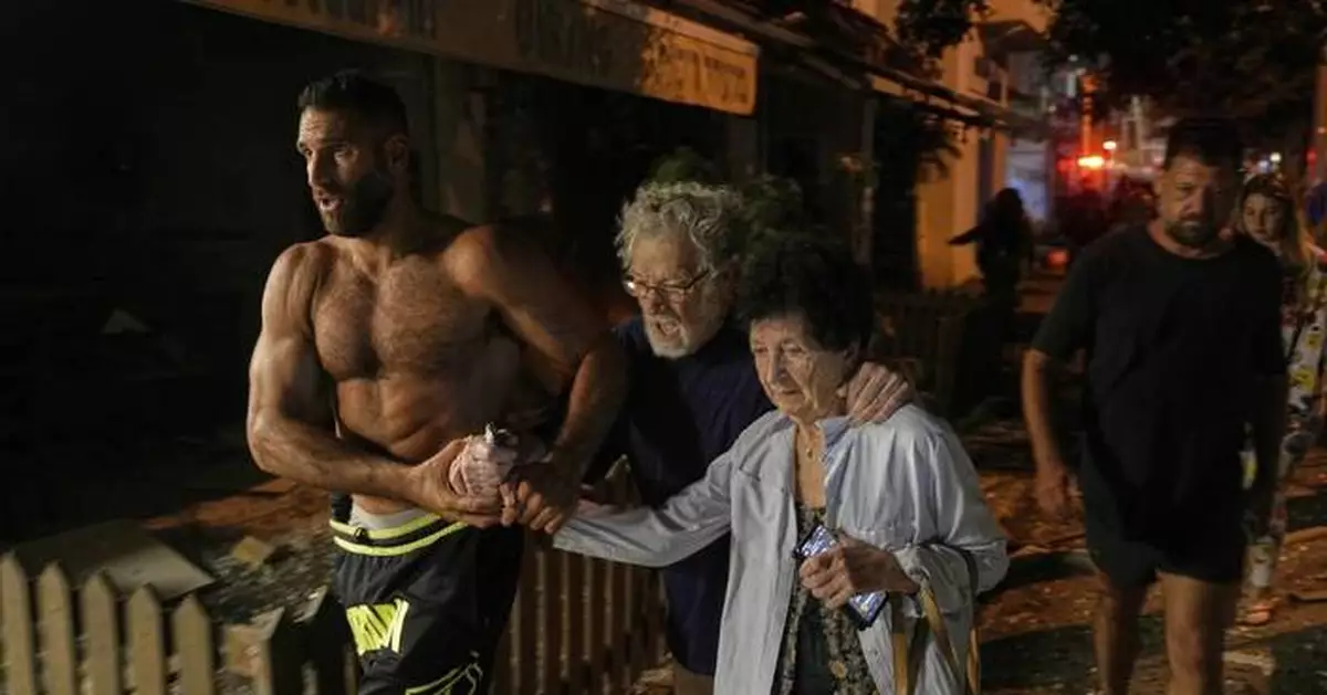 AP photos show dramatic explosions, protests and floods