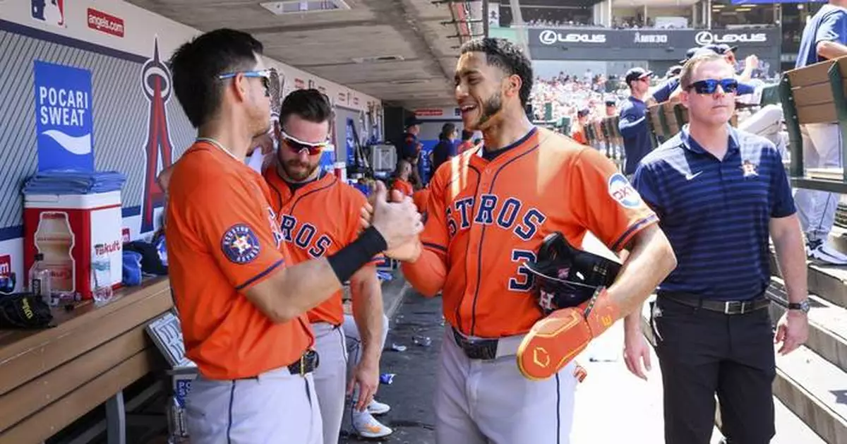 Dubón hits 2 homers and Hader retires Trout to save Astros' 8-7 win over Angels