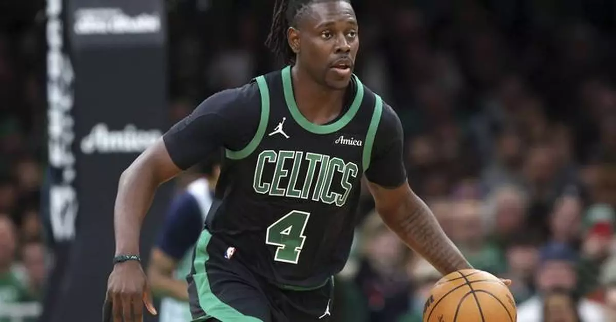 Jrue Holiday being sent from Celtics to Trail Blazers for Anfernee Simons and picks, AP source says