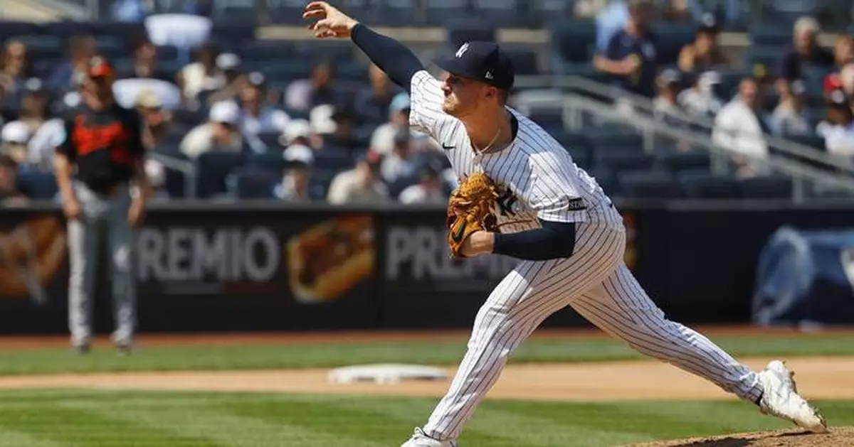 Schmidt flirts with no-hitter as Yankees dominate Orioles 9-0