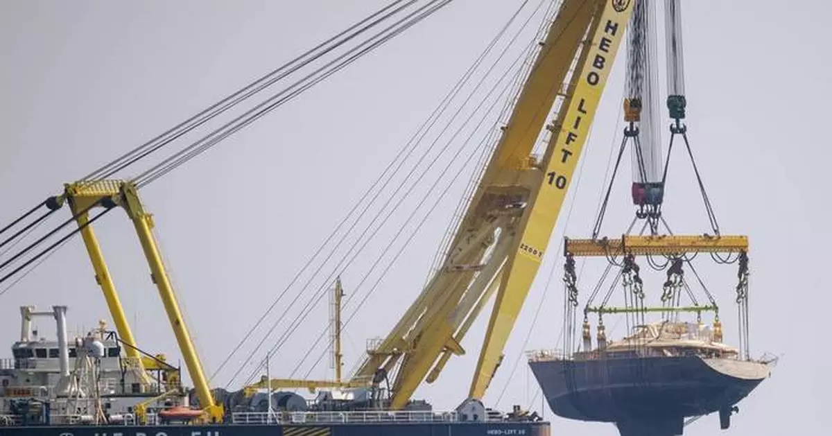 The recovered Bayesian superyacht completes its final journey to a Sicilian port